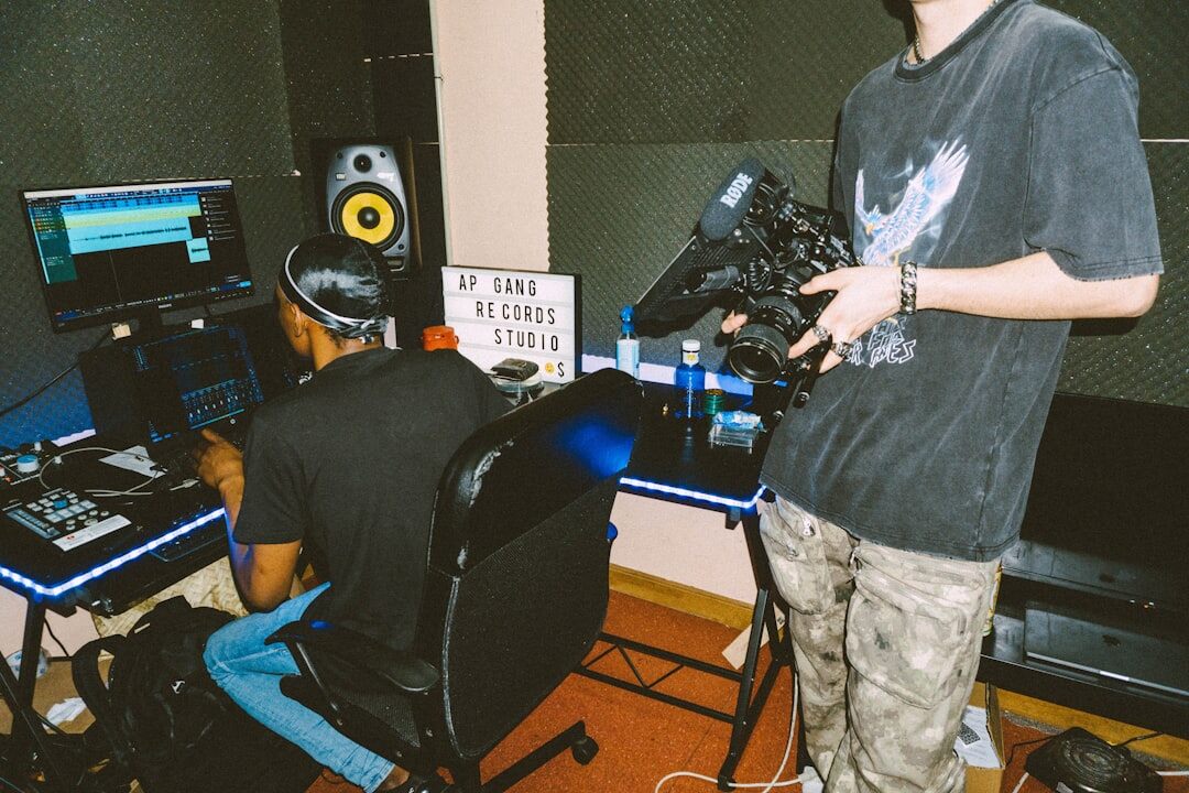 Trainees practicing live video equipment setup during a workshop