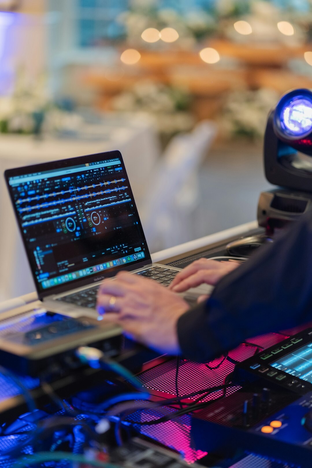 Small crew setting up live streaming equipment before a corporate event